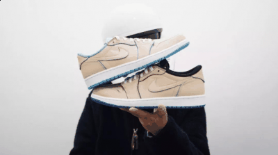 左右脚鞋帮内衬分潮牌汇潮牌网别以蓝黑、北卡蓝装饰（NIKE SB x AirJordan 1Low开箱测评 耐克SB x AJ1 Low 