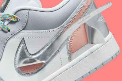 为此 Jordan Brand 近期再度潮牌信息贡献了一款全新 AJ1 Low 设计（撕撕乐 AJ1 Low 全新灰白配色鞋款曝光，酷似 Dior 联名）