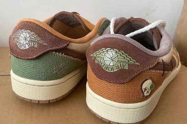 这双 Air Jordan 1 Low 以麂皮、潮牌商城麻布以及粗制麻绳鞋带等材料制作（巫毒娃娃 AJ1 Low 全新“Voodoo”配色鞋款抢先预览）