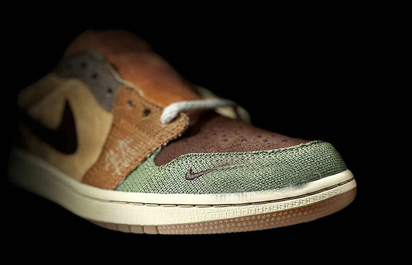 这双 Air Jordan 1 Low 以麂皮、潮牌商城麻布以及粗制麻绳鞋带等材料制作（巫毒娃娃 AJ1 Low 全新“Voodoo”配色鞋款抢先预览）