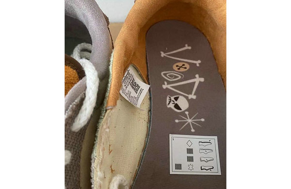 这双 Air Jordan 1 Low 以麂皮、潮牌商城麻布以及粗制麻绳鞋带等材料制作（巫毒娃娃 AJ1 Low 全新“Voodoo”配色鞋款抢先预览）