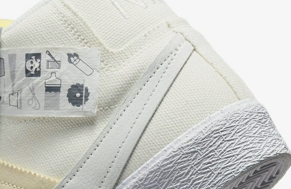 同时鞋身部分融入了解构潮牌元素以及扩大化 Swoosh logo 设计（耐克 SB Blazer Mid 全新“Warning Label”配色鞋款释出）
