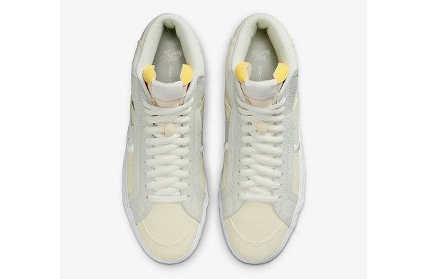 同时鞋身部分融入了解构潮牌元素以及扩大化 Swoosh logo 设计（耐克 SB Blazer Mid 全新“Warning Label”配色鞋款释出）